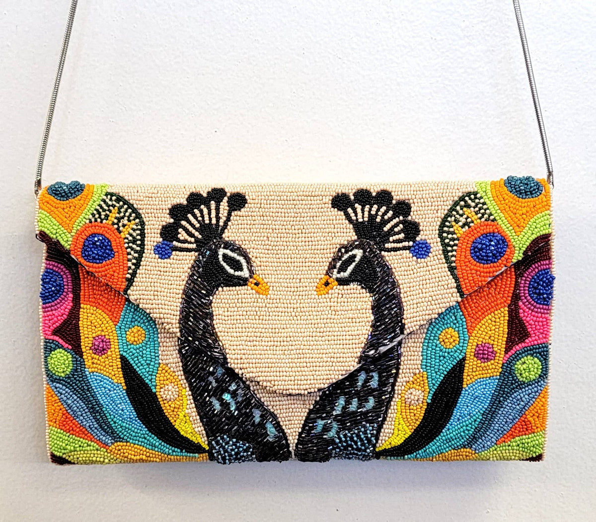 A NEW ARRIVAL 2 PEACOCK CLUTCH