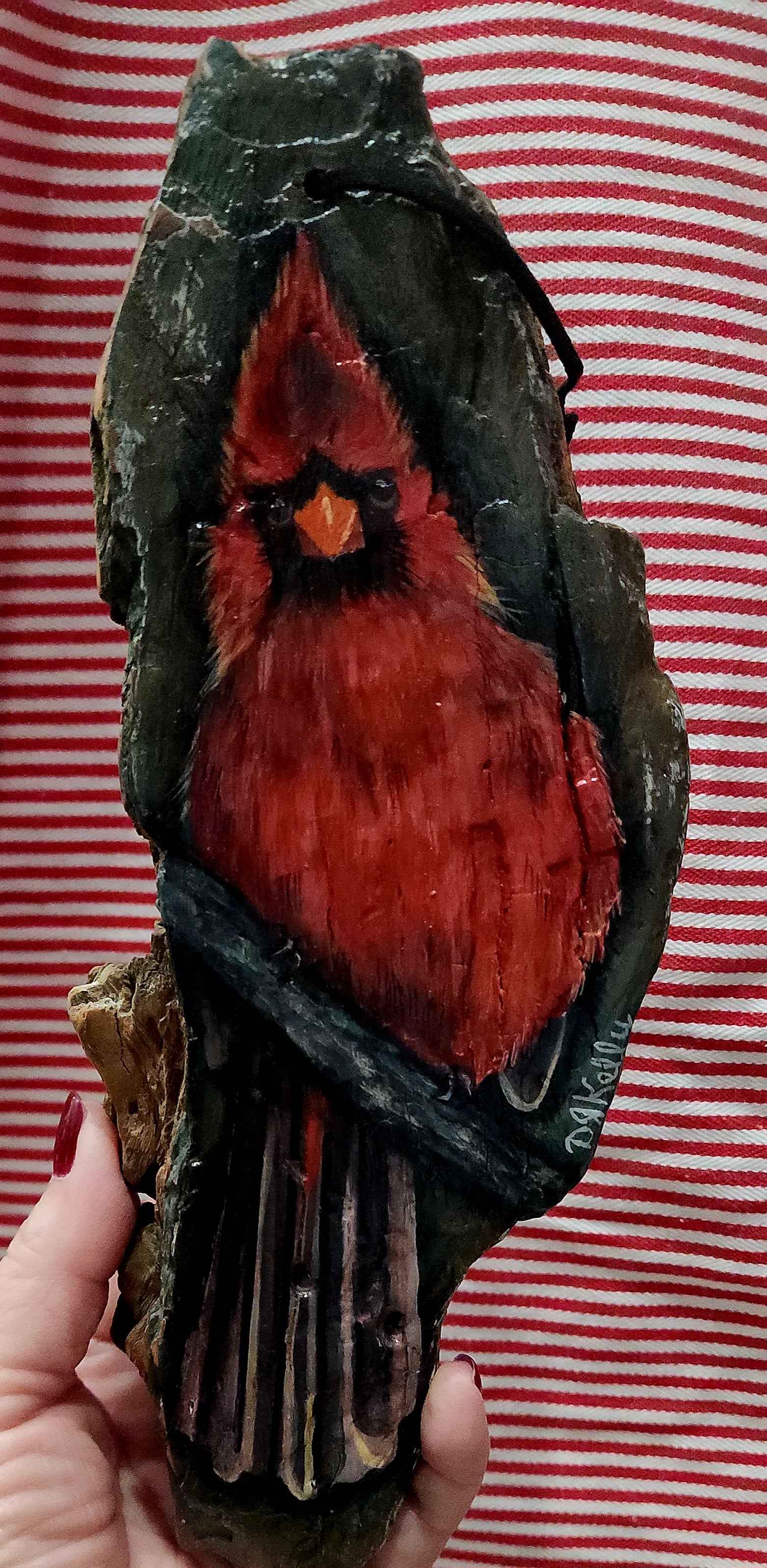 10" Cardinal on driftwood from the Mississippi , hand painted by local Memphian DJ Kelly