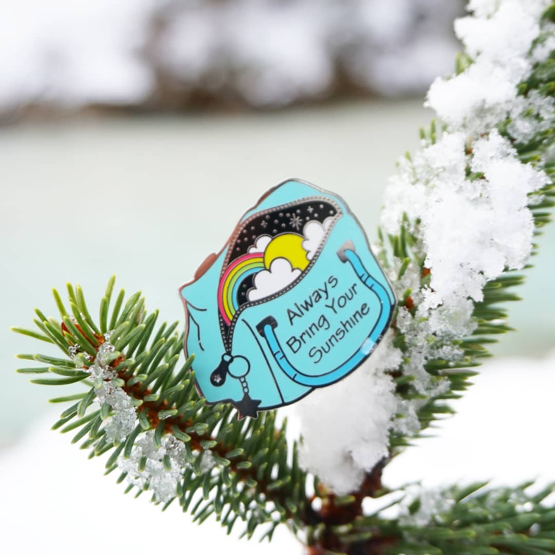 Bag Of Sunshine Enamel Pin: 35mm/1.4 inches. Thickness: 2 mm.