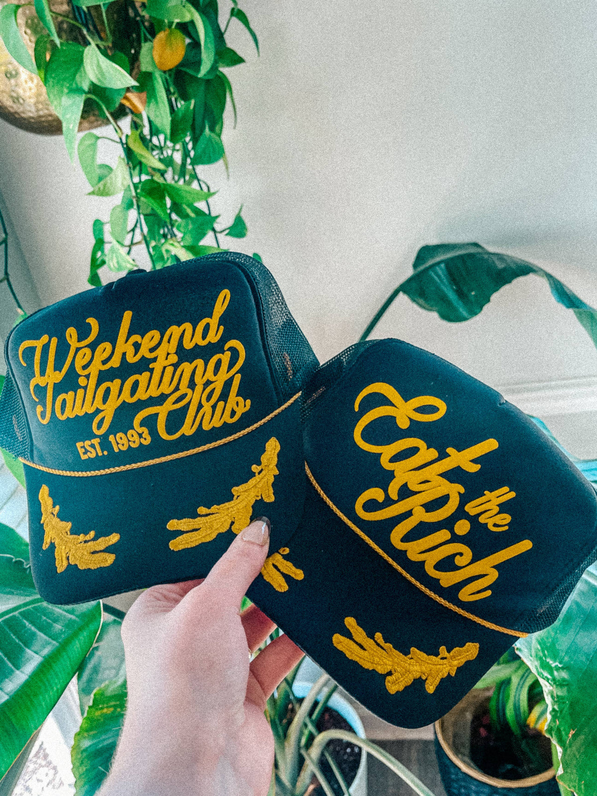 Weekend Tailgating Club, Game Day Trucker Hat: Black/Gold Leaf