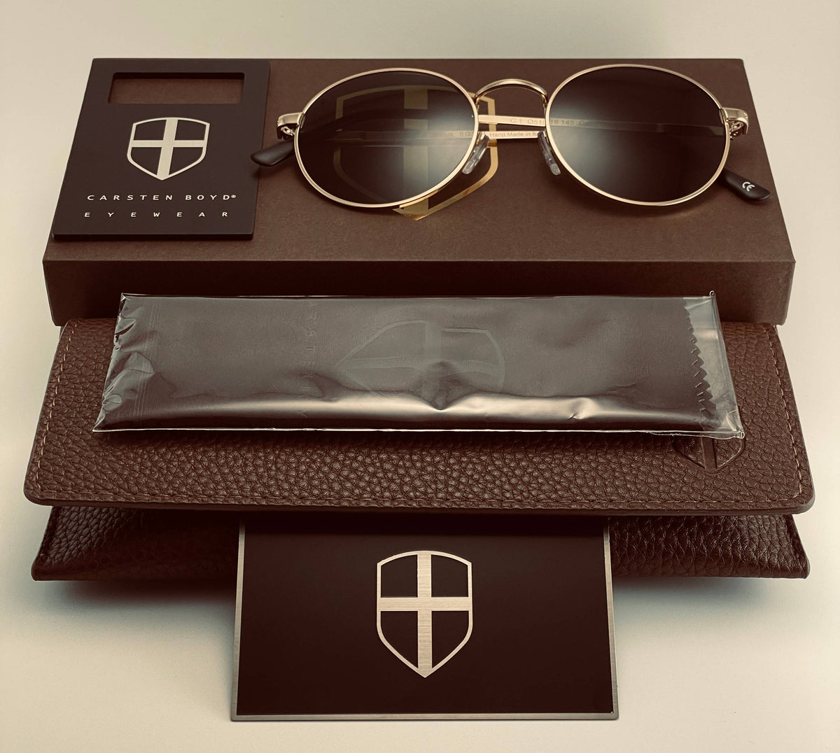 Baptiste Black Stainless Steel Sunglasses, Handmade in Italy: Silver Frame/Black Lenses or Gold Frame/Green Lenses