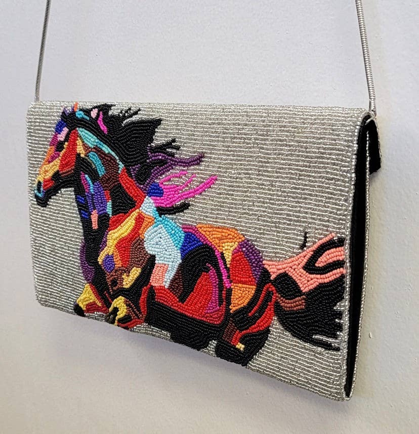 A BEADED BAG FLYING HORSE CLUTCH