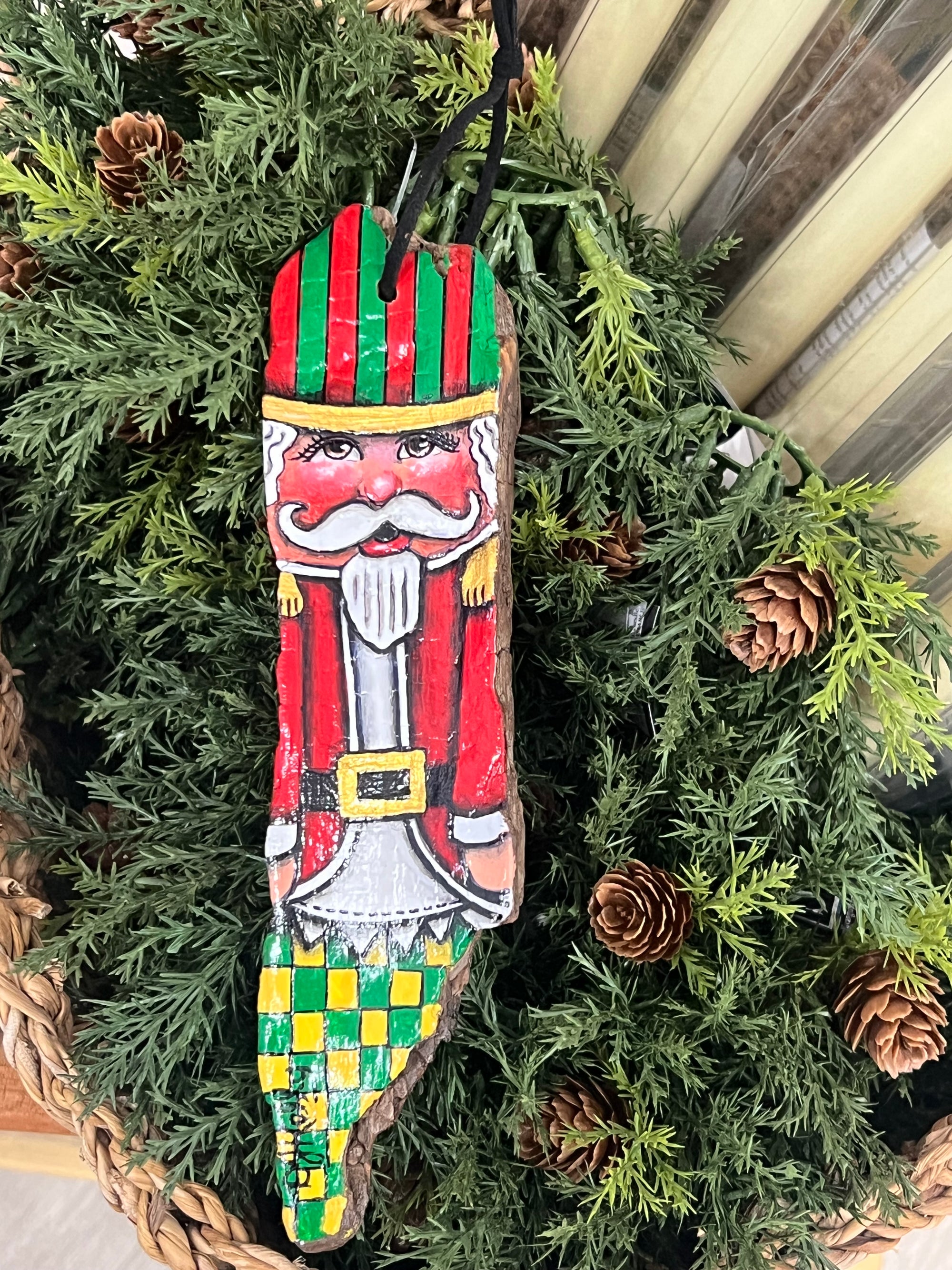 8 1/2" Traditional Christmas Nutcracker Ornament, on driftwood from the Mississippi River, hand painted by local Memphian DJ Kelly