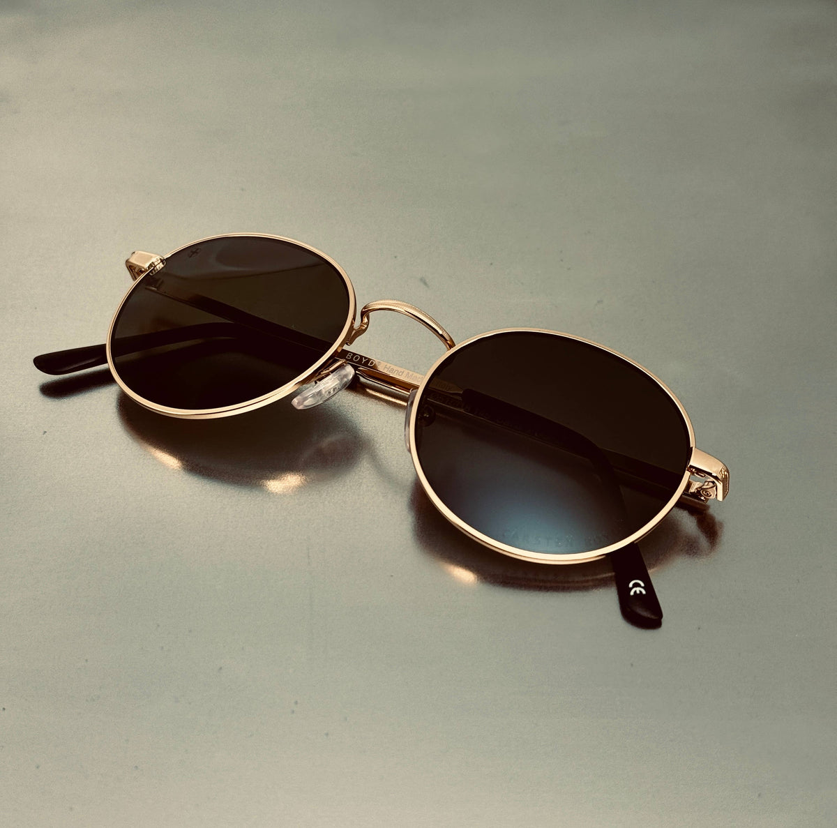 Baptiste Black Stainless Steel Sunglasses, Handmade in Italy: Silver Frame/Black Lenses or Gold Frame/Green Lenses