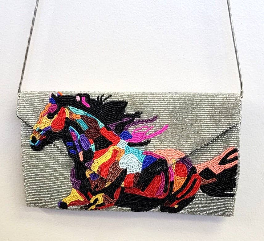 A BEADED BAG FLYING HORSE CLUTCH