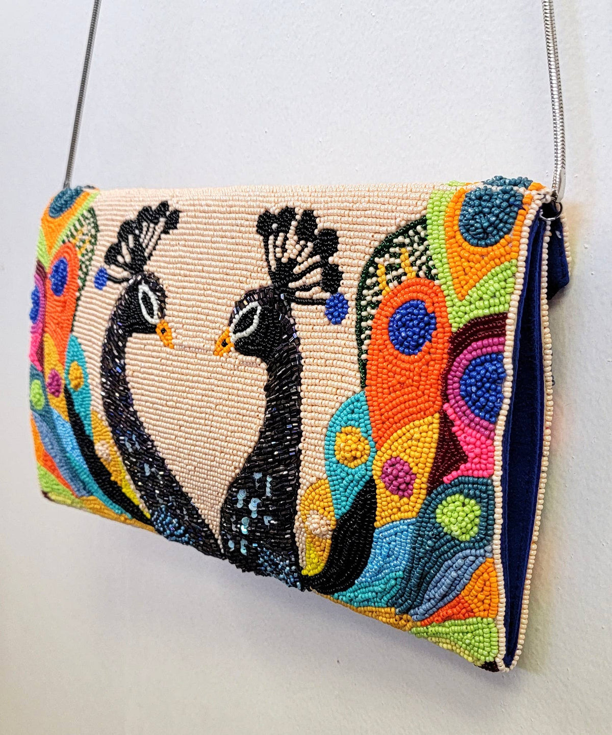 A NEW ARRIVAL 2 PEACOCK CLUTCH
