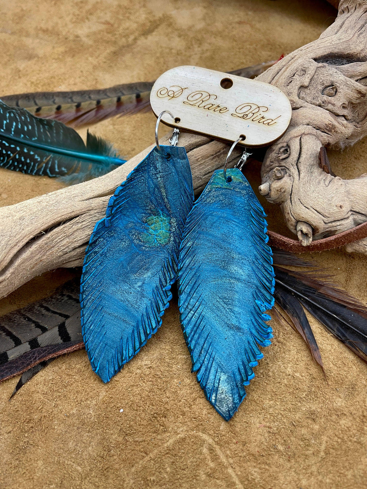 Handcut Turquoise Swirl Leather Feather Earrings